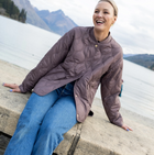 Talei by Moke lightweight quilted bomber jacket in Coco Powder, featuring a relaxed fit with ribbed collar, snap button front and curved silhouette, finished with bound edge detailing and an ultra soft velboa lining for cosy, trans seasonal layering.