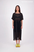 Tara Dress – Effortless, Floaty &amp; Reversible

The N-E-S Tara Dress is a one-size, oversized silhouette made from lightweight chiffon for a breezy, elegant drape. Featuring cap sleeves, a front yoke, and a drawcord at the back, this style can be worn reversed for added versatility. Finished with a soft V-neck at the back or front and a hem that falls just below the knees, it’s the perfect throw-on piece for effortless summer dressing.