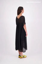 Tara Dress – Effortless, Floaty &amp; Reversible

The N-E-S Tara Dress is a one-size, oversized silhouette made from lightweight chiffon for a breezy, elegant drape. Featuring cap sleeves, a front yoke, and a drawcord at the back, this style can be worn reversed for added versatility. Finished with a soft V-neck at the back or front and a hem that falls just below the knees, it’s the perfect throw-on piece for effortless summer dressing.