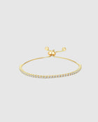 Classic sparkle, reimagined. The Castel & Co Tennis Bracelet in gold features a full row of faceted diamantés set in a sleek gold-plated finish for timeless shine. Elegant and eye-catching, it’s your go-to for adding polish to any outfit – from everyday luxe to evening glam.

Main material: stainless steel
Bracelet length: 30cm
Insert: Cubic zirconia
Waterproof and hypoallergenic
Weight: 3g