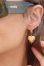 Dripping in love and Inspired by the goddess of love herself, PĀMU Aphrodite huggies are a testament to passion, grace, and timeless allure. Crafted with meticulous attention to detail, these huggies are more than just jewellery, they are an expression of love and sophistication.