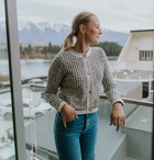 Vivian by Moke women’s cotton blend knit cardigan in white check. Textured novelty knit with a heavier weight feel for warmth and structure, featuring a classic crew neckline and gold finished vintage style buttons at the front. Designed to wear as a cardigan or cosy sweater, this versatile winter staple is made for effortless everyday dressing and designed in New Zealand.