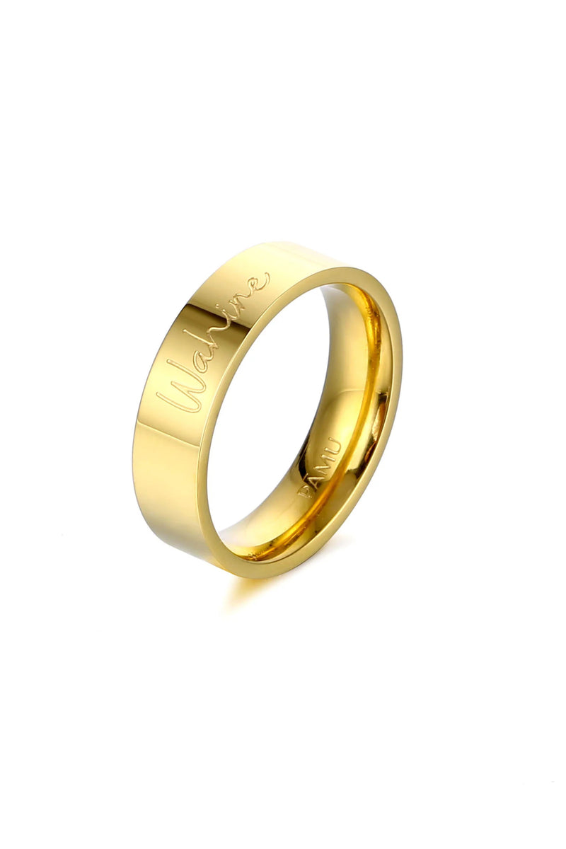 The PĀMU WAHINE RING in size 7 – Empowering Gold Band with Engraved Text Unleash your empowered spirit with the Wahine ring. Featuring the word "Wahine" meaning "woman" ,this sleek and powerful ring is a symbol of strength, resilience, and grace.&nbsp; Crafted with attention to detail, it's a daily reminder of your unique journey and an inspiring gift for exceptional women.

PĀMU jewellery is made to be worn everywhere, every day. Our pieces are water proof, sweat proof, ocean proof, nickel free and hypoall