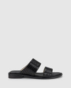 CHAOS &amp; HARMONY | WAVE SLIDE

The WAVE SLIDE in Black Snake features a subtle embossed texture that adds interest to its minimalist form. Designed as a go-to flat leather slide, it’s ideal for everyday wear — clean, easy, and comfortable from the ground up.

Black snake embossed leather slide
Soft leather lined
Black stack heel / black rubber outsole
20mm / 0.78 inch heel
Standard fit
We recommend a good leather/suede protectant to protect your shoes
Made in Dongguan, China