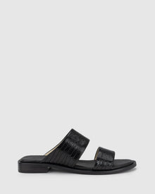 CHAOS &amp; HARMONY | WAVE SLIDE

The WAVE SLIDE in Black Snake features a subtle embossed texture that adds interest to its minimalist form. Designed as a go-to flat leather slide, it’s ideal for everyday wear — clean, easy, and comfortable from the ground up.

Black snake embossed leather slide
Soft leather lined
Black stack heel / black rubber outsole
20mm / 0.78 inch heel
Standard fit
We recommend a good leather/suede protectant to protect your shoes
Made in Dongguan, China