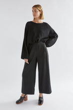 Load image into Gallery viewer, The Agna Sweater is a classic, best selling ELK style and a firm favourite of our team and customers. Appreciated for its laid back aesthetic and year-round wearability, this relaxed, boxy fit sweater features an exaggerated dropped shoulder and a fluted wide sleeve. Draping casually across the body, this sweater is crafted from a soft, comfortable alpaca-wool blend yarn.

Easy-to-style boxy cut and a relaxed fit
Dropped shoulder detail with a wide fluted sleeve
Ideal for layering
Comfortable alpaca-wool bl
