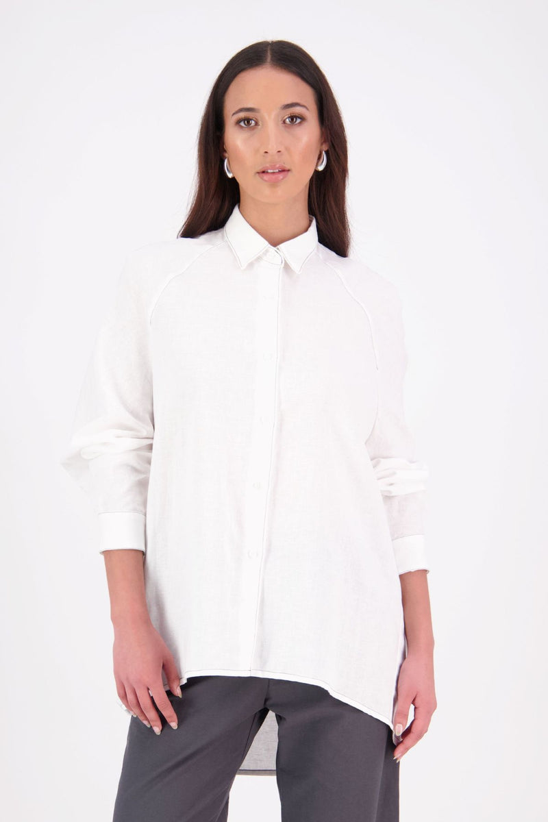 Zola linen cotton Shirt – Effortless Volume, Elevated Detail

The N-E-S Zola Shirt is a kimono-style oversized shirt with a relaxed, modern silhouette. Featuring a horizontal drop-back panel for added movement, 7/8 sleeves, a classic collar, centre front button placket, and button-up cuffs. A versatile piece that blends structure with flow—perfect for layering or wearing as a statement on its own.