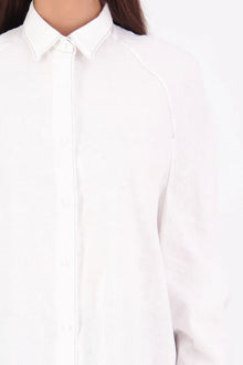 Zola cotton Shirt – Effortless Volume, Elevated Detail

The N-E-S Zola Shirt is a kimono-style oversized shirt with a relaxed, modern silhouette. Featuring a horizontal drop-back panel for added movement, 7/8 sleeves, a classic collar, centre front button placket, and button-up cuffs. A versatile piece that blends structure with flow—perfect for layering or wearing as a statement on its own.