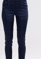 The Satin Section Pant is your go-to slightly more dressy NES essential, offering effortless style and unmatched comfort. With fabulous spliced detailing, this pant combines a sleek flat front with an elasticated back for the perfect fit. Side pockets provide practicality, while the 7/8 length and satin finish add an elevated touch to your look. Whether you're dressing up for a night out, office wear, or a special occasion, these versatile pants can easily be styled for any event. 
