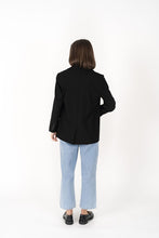 Load image into Gallery viewer, The Cosmo Blazer will instantly add effortless sophistication to any outfit! Lightweight enough to not feel heavy or restrictive but will still provide that extra layer of warmth. We love wearing her with jeans and a white tee for a chic weekend look, or pair with a pant or skirt to create a classic suit for days in the office.

Smart casual blazer with a soft, boxy silhouette.
Small subtle shoulder pads.
Lined collar with fold back lapel.
Lightweight, soft, stretch fabric with beautiful drape.
Functional p
