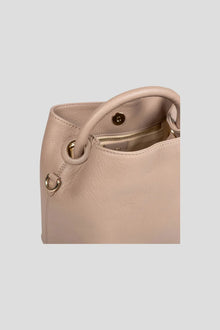 Introducing the ALEO Bon Bon Crossbody Bag, a beautiful fusion of craftsmanship, sustainability, and timeless design. Handcrafted with precision, this bag embodies the essence of slow fashion, using 100% traceable leather for a transparent and ethical approach to luxury. The genuine soft-grained leather finish offers a rich, tactile experience, enhancing both its durability and beauty over time. Genuine soft grained leather finish&nbsp;
Tote shaped bag w/ tonal handle
Detachable tonal crossbody strap