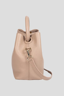 Introducing the ALEO Bon Bon Crossbody Bag, a beautiful fusion of craftsmanship, sustainability, and timeless design. Handcrafted with precision, this bag embodies the essence of slow fashion, using 100% traceable leather for a transparent and ethical approach to luxury. The genuine soft-grained leather finish offers a rich, tactile experience, enhancing both its durability and beauty over time. Genuine soft grained leather finish&nbsp;
Tote shaped bag w/ tonal handle
Detachable tonal crossbody strap