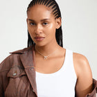 Pilgrim Cassian Necklace
Available in Gold-plated &amp; silver – plated with pendant
Trendy bow pendant
Measures 40 cm + 9 cm extension chain
The on-point look of the season
Made from 99% recycled material