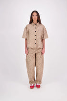 The N-E-S Demi Shirt is your ultimate summer must-have, blending a utilitarian edge with everyday versatility. Designed as a short-sleeve, boxy-fit shacket, it features a button-down front, single breast pocket, and elbow-length sleeves. Wear it open or closed—perfect for layering or styling solo through the warmer months.

Our model is 174cm and wear a XS/S (8-10)

Composition: Cotton, lycra

Designed and Made in New Zealand