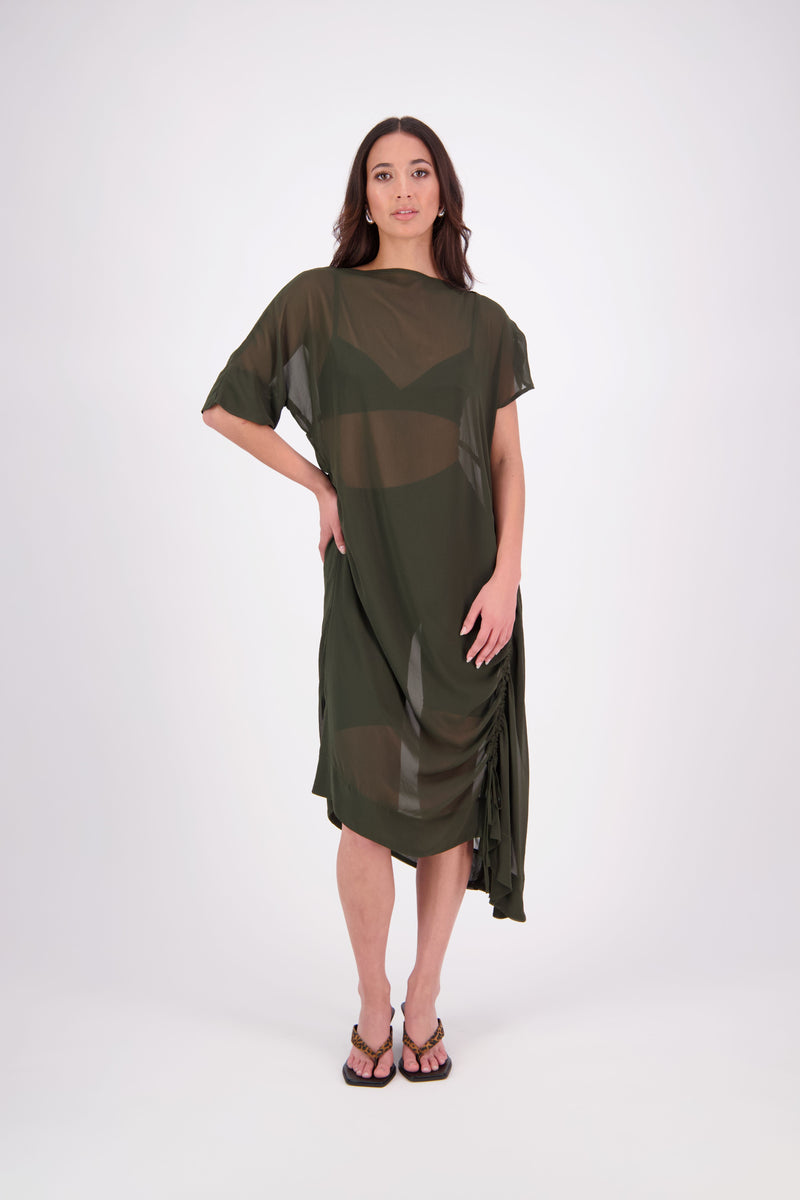 The N-E-S Em Dress is a statement style crafted in lightweight chiffon, designed with ruching and a drawcord that lets you adjust the length to suit your look. Featuring a cap sleeve on the left and a cuffed short sleeve on the right, it embraces asymmetry with a wide cuff hem for added edge. Floaty yet bold, the Em Dress is your go-to for elevated, directional dressing.

Our model is 174cm and wears a XS (8)
NES fit advise: Standard fit

Composition: PT Chiffon

Designed and Made in New Zealand