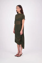 The N-E-S Em Dress is a statement style crafted in lightweight chiffon, designed with ruching and a drawcord that lets you adjust the length to suit your look. Featuring a cap sleeve on the left and a cuffed short sleeve on the right, it embraces asymmetry with a wide cuff hem for added edge. Floaty yet bold, the Em Dress is your go-to for elevated, directional dressing.

Our model is 174cm and wears a XS (8)
NES fit advise: Standard fit

Composition: PT Chiffon

Designed and Made in New Zealand
