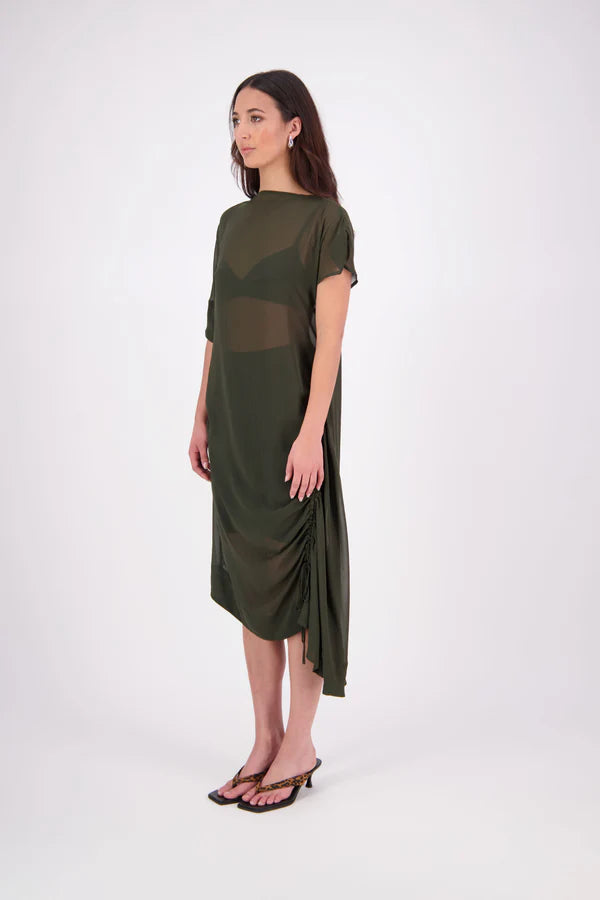 The N-E-S Em Dress is a statement style crafted in lightweight chiffon, designed with ruching and a drawcord that lets you adjust the length to suit your look. Featuring a cap sleeve on the left and a cuffed short sleeve on the right, it embraces asymmetry with a wide cuff hem for added edge. Floaty yet bold, the Em Dress is your go-to for elevated, directional dressing.

Our model is 174cm and wears a XS (8)
NES fit advise: Standard fit

Composition: PT Chiffon

Designed and Made in New Zealand