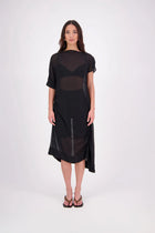 The N-E-S Em Dress is a statement style crafted in lightweight chiffon, designed with ruching and a drawcord that lets you adjust the length to suit your look. Featuring a cap sleeve on the left and a cuffed short sleeve on the right, it embraces asymmetry with a wide cuff hem for added edge. Floaty yet bold, the Em Dress is your go-to for elevated, directional dressing.

Our model is 174cm and wears a XS (8)
NES fit advise: Standard fit

Composition: PT Chiffon

Designed and Made in New Zealand