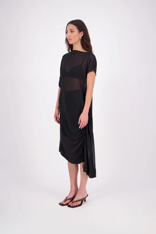 The N-E-S Em Dress is a statement style crafted in lightweight chiffon, designed with ruching and a drawcord that lets you adjust the length to suit your look. Featuring a cap sleeve on the left and a cuffed short sleeve on the right, it embraces asymmetry with a wide cuff hem for added edge. Floaty yet bold, the Em Dress is your go-to for elevated, directional dressing.

Our model is 174cm and wears a XS (8)
NES fit advise: Standard fit

Composition: PT Chiffon

Designed and Made in New Zealand