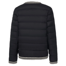 Fern by Moke women’s down puffer jacket in black and olive green. Bold, modern winter coat filled with 90 percent duck down and 10 percent waterfowl feathers for lightweight warmth. Features crochet knit trim at the hems and cuffs, exposed snap front closure with branded metal hardware, and a refined silhouette designed in New Zealand for elevated everyday cold weather wear.