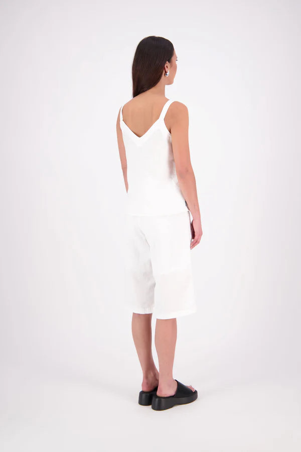 The N-E-S Rita Short is an easy update to our classic Gin Short, crafted in a breathable linen-cotton blend. Featuring a single front leg pleat for subtle shape, angled front pockets, and an elasticated back waistband for comfort. A decorative front drawcord adds detail, with a length finishing just below the knee—perfect for relaxed yet polished summer dressing.

White colourway has a 1/2 liner in a cotton voile
Our model is 174cm and wear a XS (8)
Composition: Linen Cotton
Designed and Made in New Zealand