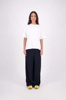 We’ve had some fun with our NES Gin Pants, adding a contrast side seam piping detail for a stylish twist on a classic design. These pants feature a flattering, classic cut that’s perfect for both dressing up and down, making them an ideal work pant and an effortless everyday style. With a flat front, covered elasticated back, and flattering angled pockets, they offer both comfort and sophistication.
Composition: 100% Polyester
Designed & Made in New Zealand