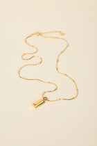 ALTA JEWELLERY | GOLDEN BAR NECKLACE

Minimalist yet striking, the Alta Golden Bar Necklace is a modern essential for any jewellery collection. Crafted in S925 sterling silver with a luxurious layer of 18k gold vermeil, this sleek bar pendant sits elegantly on a fine chain, offering a clean and contemporary finish.