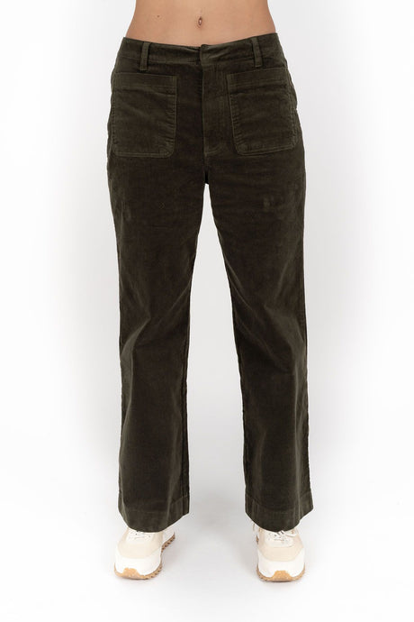 Super stretchy pocket detail corduroy pants.
Can be worn high or mid waisted with straight leg and relaxed fit. 
Zip fly with concealed clasp and button closure.
Belt loops at waist.
The functional patch pockets at front and back are a design feature of these pants.
Darts at back offer a figure-flattering fit.
Super stretchy, mid-weight 11 whale corduroy that is oh-so lush to touch.
Sits at ankle length on average height.
