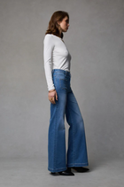 Indy Rodeo Wide Leg Jean by Dricoper in rodeo-blue stretch denim, featuring a high-rise waist, relaxed wide-leg silhouette, and statement patch pockets. Made from 99% cotton and 1% elastane for comfortable stretch. Model is 176cm tall and wears a size 8/Small.