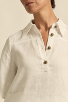 The Insinuate top from Zoe Kratzmann is elevated simplicity, reimagined. This top blends contemporary classics with soft femininity, making it a versatile hero for trans-seasonal outfitting. see product details below.

crafted in 100% linen
crisp collar offers structure and sophistication
flutter sleeve adds subtle volume and movement
brass domed buttons for modern polish
refined, versatile style perfect for effortless layering
pair with the apex pant in porcelain for trans-seasonal styling