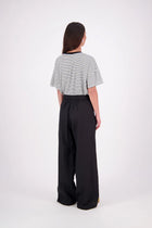 The N-E-S Rita Pant is a full-length take on our bestselling short, crafted in a breathable linen-cotton blend with a relaxed silhouette and subtle front leg pleat. Featuring angled front pockets, a flat front with a decorative drawcord, and an elasticated back waistband for all-day ease. The white colourway includes a half lining in soft cotton voile for added coverage and comfort.

Our model is 174cm and wears a XS (8)

Composition: Linen Cotton

Designed and Made in New Zealand
