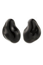 PILGRIM | LIAN RECYCLED BLACK EARRINGS - SILVER PLATED

Unleash your bold side! Add an edgy twist to your style with the statement-ready LIAN earrings from Pilgrim! Crafted in deep black recycled acrylic with an organic, fluid shape that radiates strength and confidence. Perfect for those who love to express their distinctive style with a cool edge. Style them with an oversized blazer and chunky boots for an urban-chic appearance, or pair with a slip dress for a contrasting look.