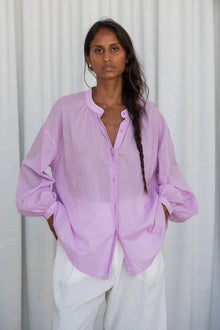 The LILLY PILLY EMBER Cotton Voile Shirt is made for warm, sun-drenched days. EMBER is crafted from sheer, featherlight 100% cotton voile that’s exceptionally breathable and quick to dry. Featuring a relaxed fit, placket details, and corozo buttons made from palm tree seeds, EMBER brings a touch of ease to any outfit, she’s the layer you’ll reach for all summer long.