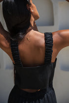 Look ready to take on the world in the LILLY PILLY KEELY LINEN JUMPSUIT! Ready for any occasion, this jumpsuit is crafted from 100% European linen, features a subtle back cut-out for added comfort, side pockets for convenience, and elastic shoulder straps for the perfect fit - no zippers or buttons required.