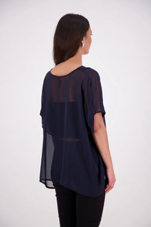  The N-E-S Luna Top – A New Take on Sheer Simplicity
The Luna Top is a modern evolution of a NES favourite. Crafted with exposed French seams on the outside, an angled front seam, and a left-side split for added movement, this sheer layer brings elevated ease to any outfit. Style it over a NES lattice singlet or your favourite base – the Luna Top is designed for effortless layering with a refined edge.
polyester chiffon
designed & made in NZ