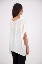  The N-E-S Luna Top – A New Take on Sheer Simplicity
The Luna Top is a modern evolution of a NES favourite. Crafted with exposed French seams on the outside, an angled front seam, and a left-side split for added movement, this sheer layer brings elevated ease to any outfit. Style it over a NES lattice singlet or your favourite base – the Luna Top is designed for effortless layering with a refined edge.
polyester chiffon
designed & made in NZ