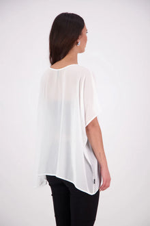  The N-E-S Luna Top – A New Take on Sheer Simplicity
The Luna Top is a modern evolution of a NES favourite. Crafted with exposed French seams on the outside, an angled front seam, and a left-side split for added movement, this sheer layer brings elevated ease to any outfit. Style it over a NES lattice singlet or your favourite base – the Luna Top is designed for effortless layering with a refined edge.
polyester chiffon
designed & made in NZ