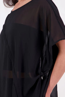  The N-E-S Luna Top – A New Take on Sheer Simplicity
The Luna Top is a modern evolution of a NES favourite. Crafted with exposed French seams on the outside, an angled front seam, and a left-side split for added movement, this sheer layer brings elevated ease to any outfit. Style it over a NES lattice singlet or your favourite base – the Luna Top is designed for effortless layering with a refined edge.
polyester chiffon
designed & made in NZ