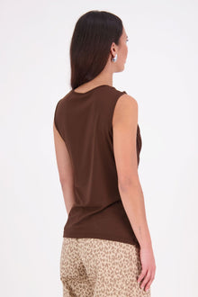 The N-E-S Lyla Mesh Tank is a sheer take on our popular Eva Tank, designed in a soft, stretch mesh. Featuring front ruching and a double-layered front for added coverage, this style falls just below the waistband for a flattering, easy-to-style fit. Perfect for layering or wearing as a statement on its own.