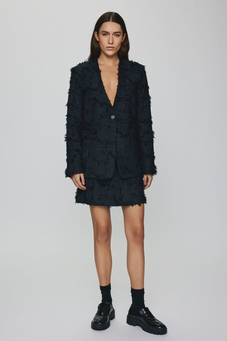 A classic mini skirt with a twist. The MSCH Augustina Skirt features structured a material which brings the skirt to life. It features a Centre back hidden zip closure. Style it with the matching blazer, a pair of stocking and cool boots.