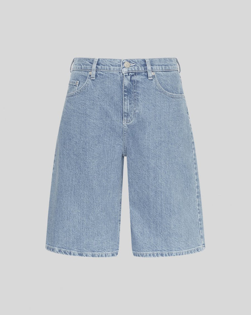 MSCH | ELIDA ADA DENIM SHORTS
The wait is over - the Bermuda short is back and better than ever. Crafted in classic light blue denim, these shorts feature a flattering longer length and a relaxed yet polished fit. Finished with front and back pockets, belt loops, and a traditional button-and-zip closure, they’re the ultimate warm weather staple. Timeless, effortless, and endlessly wearable - your must-have denim short for summer.