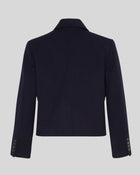 MSCH | ELINA BLAZER

A short, navy blue blazer with dark blue buttons with gold rim. These buttons is both down the front and on the cuffs. The blazer features a front pocket design inspired by a military jacket. Style it with a pair of jeans for a cool and causal look or with the matching skirt.

This blazer has a boxy fit. The model is 177cm and wears a size S.

Composition: 50% Recycled Polyester, 35% Viscose &amp; 15% Polyester