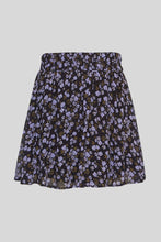 Load image into Gallery viewer, The MSCH Kasandra Orabella skirt is a mini skirt, in a purple floral print with an elastic waistband. The skirt features a double layer, whereas the top layer is floral printed and slightly see-through, with a black layer underneath to ensure coverage. Style this feminine skirt with your favorite knitted pullover and a pair of boots.
