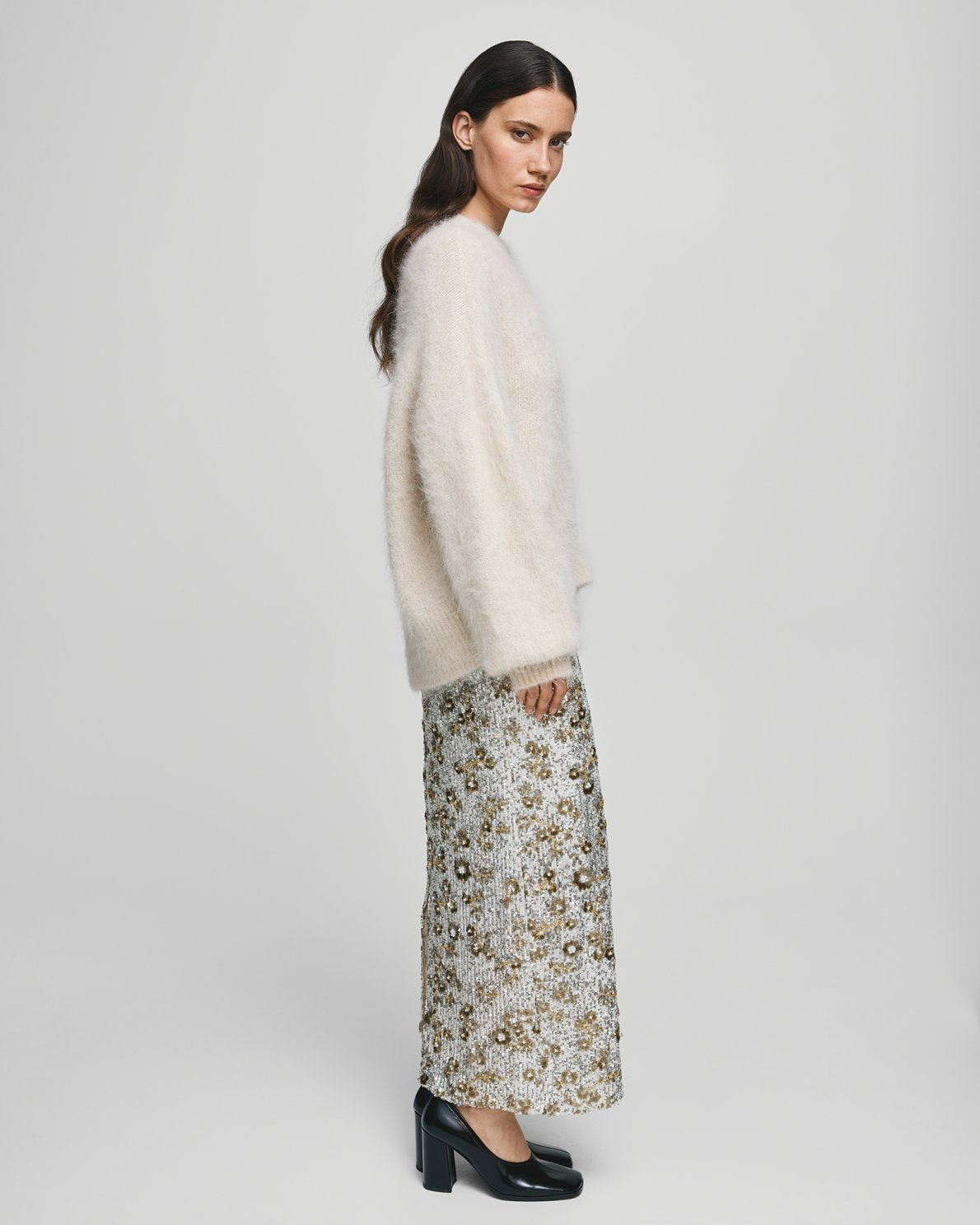MSCH Copenhagen Magnolia Skirt with shimmering sequin detailing, designed in a flattering high waisted silhouette with a straight cut fit. Crafted from a comfortable polyester and elastane blend, this statement skirt adds a touch of glamour to both casual styling and elevated evening looks.