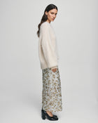 MSCH Copenhagen Magnolia Skirt with shimmering sequin detailing, designed in a flattering high waisted silhouette with a straight cut fit. Crafted from a comfortable polyester and elastane blend, this statement skirt adds a touch of glamour to both casual styling and elevated evening looks.