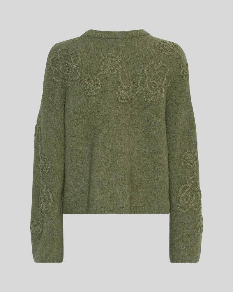 MSCH Copenhagen Miabelle Hope Pullover EMB in muted olive green with embroidered floral detailing and a relaxed boxy fit. Designed with a round neckline and classic long sleeves, crafted from a soft blend of wool, alpaca, acrylic, recycled polyester, polyester, and elastane for a cosy everyday feel.
