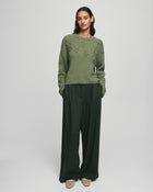 MSCH Copenhagen Miabelle Hope Pullover EMB in muted olive green with embroidered floral detailing and a relaxed boxy fit. Designed with a round neckline and classic long sleeves, crafted from a soft blend of wool, alpaca, acrylic, recycled polyester, polyester, and elastane for a cosy everyday feel.