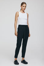 Load image into Gallery viewer, The msch Popye Pants are a versatile and comfortable addition to any wardrobe, offering a relaxed yet polished look. Crafted from a soft and breathable fabric, these pants feature an elasticated waistband with a drawstring for an adjustable fit, ensuring maximum comfort throughout the day.
