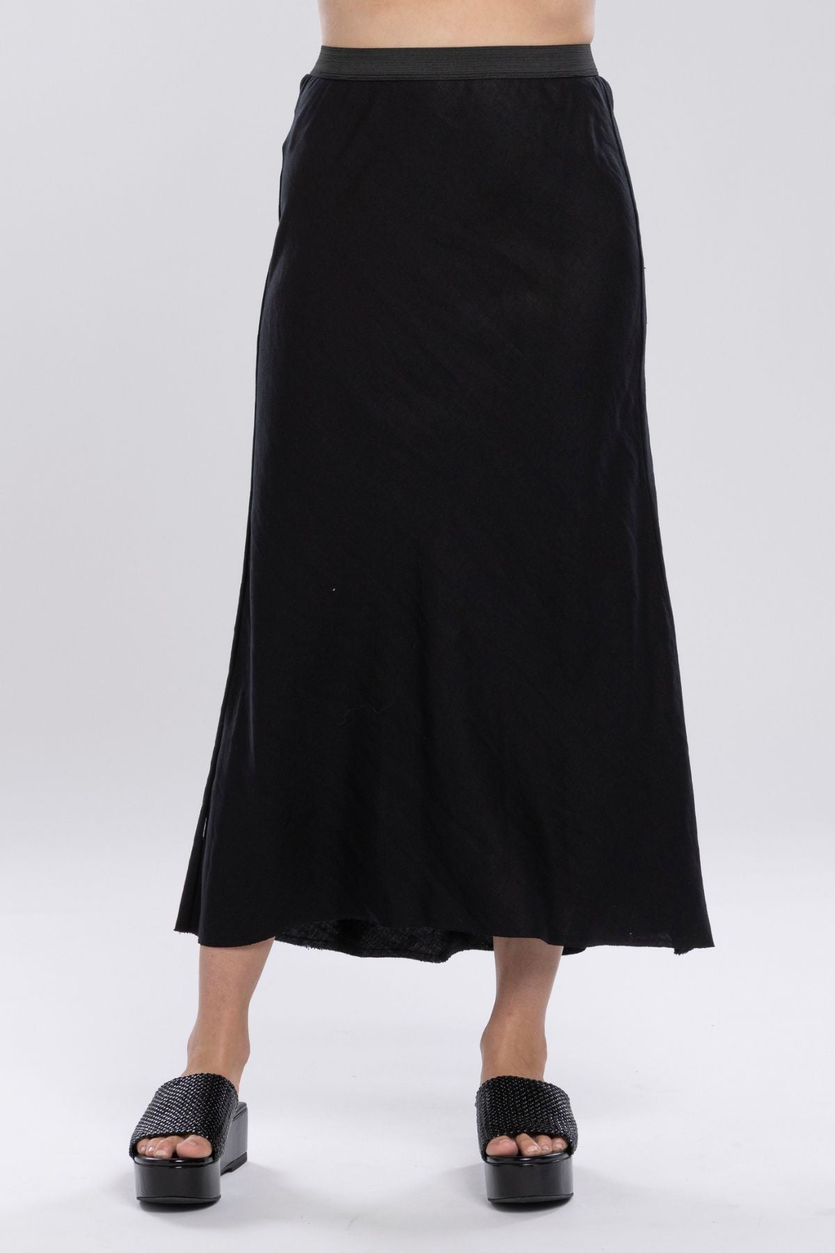 The N-E-S Muse Linen Skirt is a true wardrobe staple, designed to flatter with its bias cut and fluid drape. Featuring a wide elasticated waistband, raw hemline, and a signature concave front with a dropped back hem, it moves with ease and style. Crafted in a breathable linen-cotton blend, this multi-seasonal piece pairs perfectly with everything from relaxed tees to elevated blouses.
Available in: Black &amp; White (1/2 lined)
Composition: Linen Cotton. DESIGNED & MADE IN NZ