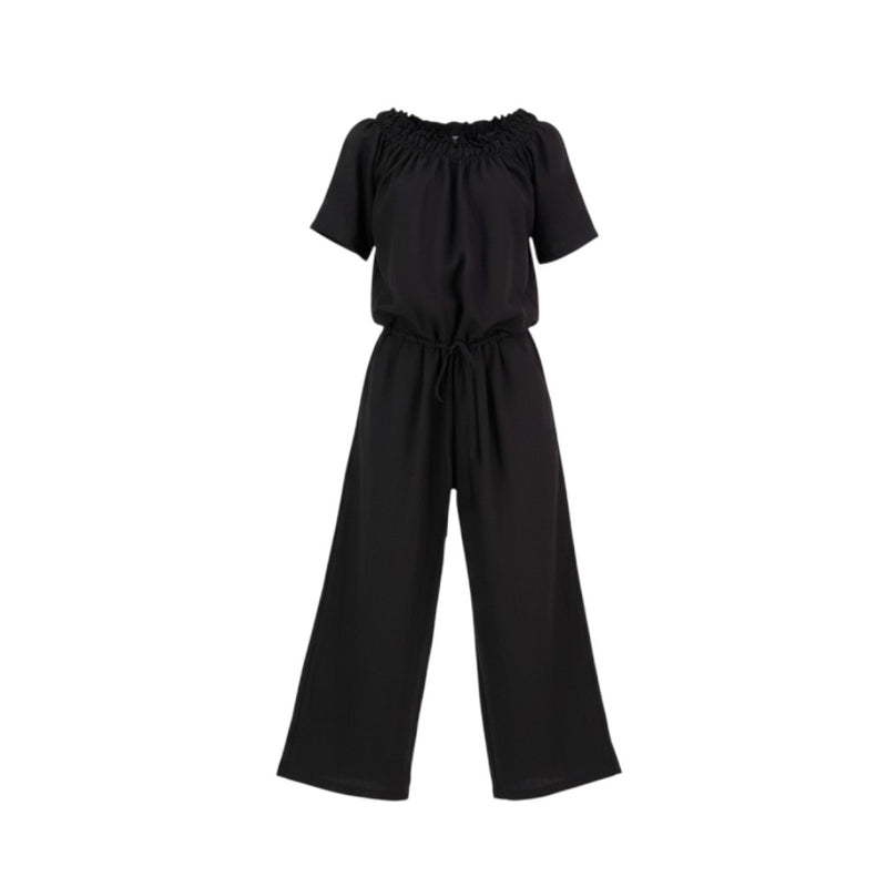 The N-E-S Muses Jumpsuit features a shirred off-the-shoulder top with cap sleeves, an elasticated back waist, and a self-drawcord front for a flattering, adjustable fit. The lower half mirrors the relaxed fit of our Lounge Jumpsuit, with angled seams, centre front detailing, and practical front pockets